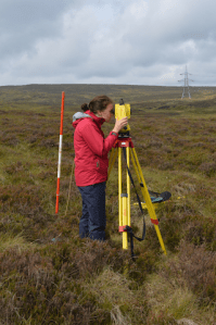 Placement student Carly Robertson using a total station theodolite at Muirshiel